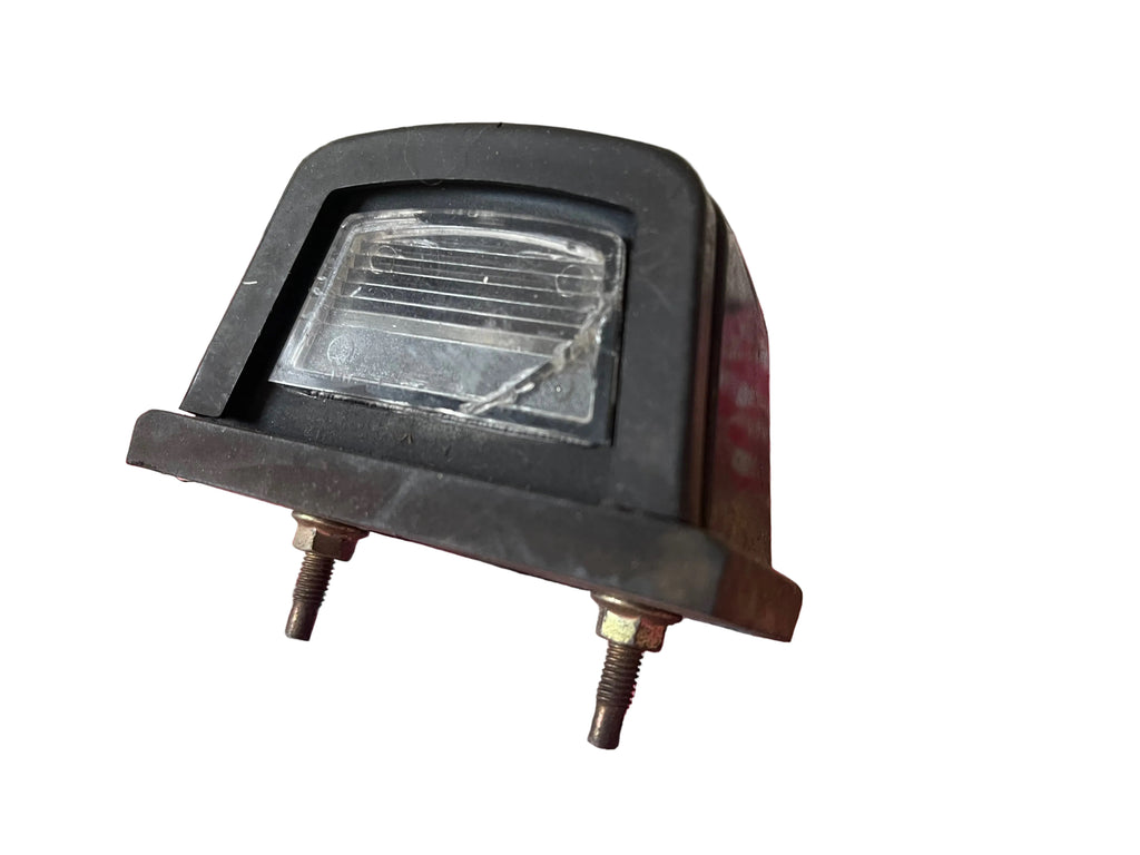 (USED)Genuine OEM Rear Number Plate Lamp - Toyota Corolla AE82 (1985) - secondhand - came off a Toyota Corolla 1985 AE82 Sedan